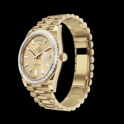 Rolex Day-Date: 36 mm, Yellow gold, with a champagne colour, Diamond-set dial, Diamond-set bezel and a President bracelet, m228348rbr-0002