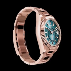 Rolex Sky-Dweller: 42 mm, Everose gold with a blue-green dial and an Oyster bracelet, m336935-0001