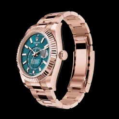 Rolex Sky-Dweller: 42 mm, Everose gold with a blue-green dial and an Oyster bracelet, m336935-0001